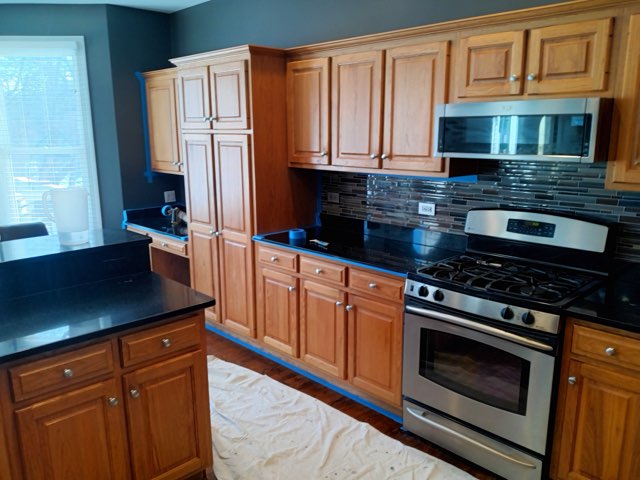 Refinished wood kitchen cabinets