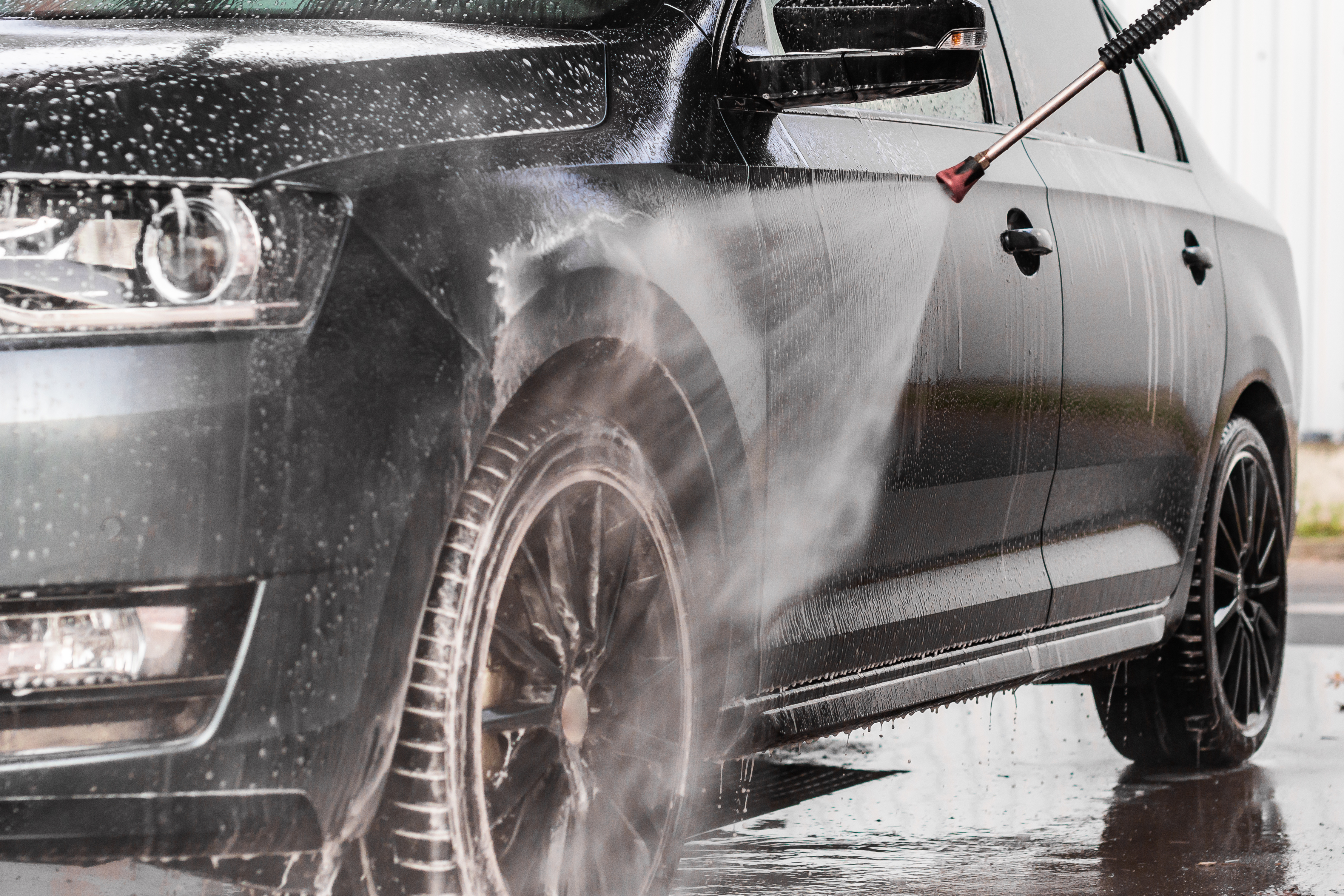 Vehicle being washed and detailed